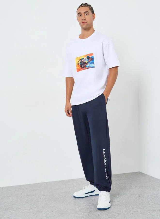 Men Navy Blue Slogan Print Relaxed Joggers